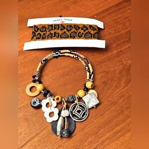 Two tribal animal style necklaces